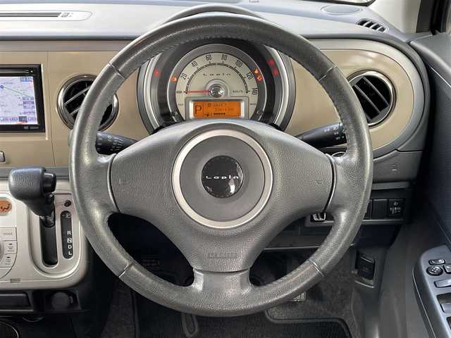 スズキ ラパン XL 岡山県 2013(平25)年 5.4万km アーバンブラウンパールメタリック 登録時走行距離53414km/社外SDナビ/(AM/FM/DISC/TV)/バックカメラ/D席シートヒーター/アイドリングストップ/プッシュスタート/スマートキー/純正14インチアルミホイール/パワーステアリング/パワーウィンドウ/保証書/記録簿/取扱説明書/ハロゲンヘッドライト