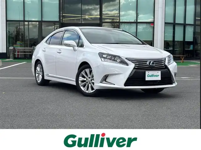 レクサス ＨＳ 250h バージョンI 奈良県 2015(平27)年 6.3万km ソニッククォーツ 純正ナビ/（フルセグ／ＢＴ／ＣＤ／ＤＶＤ）/レーダークルーズコントロール/バックカメラ/前後コーナーセンサー/パワーバックドア/ベージュレザーシート/前席メモリ付きパワーシート/前席シートヒーター／エアーシート/ヘッドアップディスプレイ/ステアリングスイッチ/LEDヘッドライト/オートライト/前方ドライブレコーダー（DRT-H68A）/ETC/純正17インチAW/保証書/取り扱い説明書/スペアキーX1