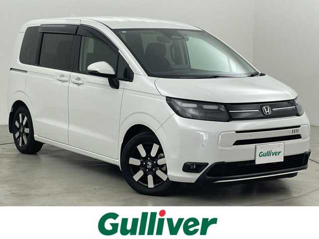 ホンダ フリード AIR EX 福岡県 2024(令6)年 1.5万km プラチナホワイトパール 純正１１．４型ナビ／フルセグＴＶ　/バックカメラ　/ナビ連動前後ドラレコ　/ＥＴＣ　/レーダークルコン　/コーナーセンサー　/衝突被害軽減ブレーキ　/レーンキープ　/ＢＳＭ　/アクセル踏み間違い防止　/両側電動スライドドア　/シートヒーター　/ハーフレザーシート　/純正1５インチアルミホイール　/ＬＥＤヘッドライト