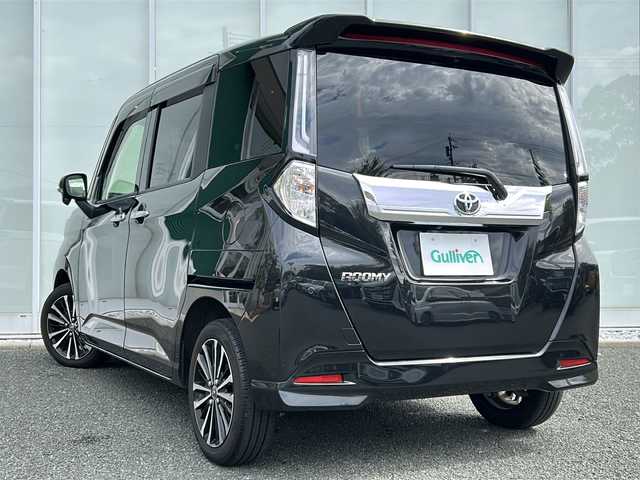 トヨタ ルーミー カスタムG－T 福岡県 2022(令4)年 2.4万km ブラックマイカメタリック 純正9型ナビ（フルセグ/CD/DVD/BT)/バックカメラ/両側パワースライドドア/テレビキャンセラー/レーダークルーズコントロール/LEDヘッドライト/オートライト/レザー調シートカバー/純正15インチAW/アイドリングストップ/プリクラッシュセーフティ/横滑り防止装置/レーンキープアシスト/盗難防止装置/クリアランスソナー/ドライブレコーダー/スマートキー/ETC
