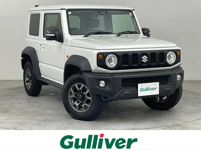 スズキ ジムニー シエラ JC 道央・札幌 2023(令5)年 2.7万km ピュアホワイトP ・衝突軽減ブレーキ/・社外ＳＤナビ/・ＥＴＣ/・クルーズコントロール/・シートヒーター/・ダウンヒルアシストコントロール/・全方位ドライブレコーダー/・レーンアシスト/・アイドリングストップ/・スマートキー＆プッシュスタート/・ヘッドライトウォッシャー/・CD／DVD再生/・フルセグTV/・LEDヘッドライト/・フロントフォグランプ/・オートエアコン/。横滑り防止機能/・２WD／４WD切替/・盗難防止装置
