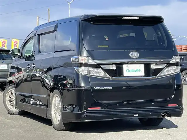 トヨタ ヴェルファイア 2．4Z Gエディション 道央・札幌 2012(平24)年 8.4万km ブラック ４WD/純正ディーラーOPナビ/CD/DVD/BT/フルセグ/純正フリップダウンモニター/横滑り防止装置/クルーズコントロール/クリアランスソナー/パーキングアシスト/センターデフロック/バックカメラ/ビルトインETC/ドライブレコーダー/ECOMODE/nanoe/両側パワースライドドア/パワーバックドア/前席/２列目パワーシート/D席メモリーシート/N席/２列目オットマン/革巻きウッドコンビステアリング/ステアリングリモコン/MTモード付AT/プッシュスタート/スマートキー/HIDヘッドライト/オートライト/フォグランプ/電動格納ミラー/ウィンカーミラー/純正フロアマット/ドアバイザー/スペアキー/社外エンジンスターター