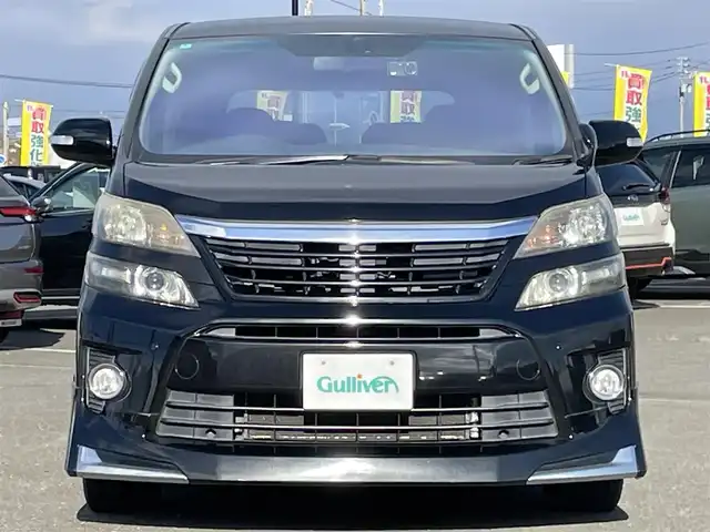 トヨタ ヴェルファイア 2．4Z Gエディション 道央・札幌 2012(平24)年 8.4万km ブラック ４WD/純正ディーラーOPナビ/CD/DVD/BT/フルセグ/純正フリップダウンモニター/横滑り防止装置/クルーズコントロール/クリアランスソナー/パーキングアシスト/センターデフロック/バックカメラ/ビルトインETC/ドライブレコーダー/ECOMODE/nanoe/両側パワースライドドア/パワーバックドア/前席/２列目パワーシート/D席メモリーシート/N席/２列目オットマン/革巻きウッドコンビステアリング/ステアリングリモコン/MTモード付AT/プッシュスタート/スマートキー/HIDヘッドライト/オートライト/フォグランプ/電動格納ミラー/ウィンカーミラー/純正フロアマット/ドアバイザー/スペアキー/社外エンジンスターター