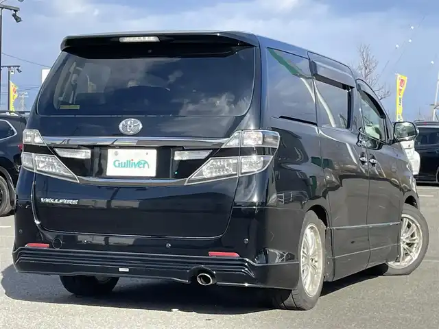 トヨタ ヴェルファイア 2．4Z Gエディション 道央・札幌 2012(平24)年 8.4万km ブラック ４WD/純正ディーラーOPナビ/CD/DVD/BT/フルセグ/純正フリップダウンモニター/横滑り防止装置/クルーズコントロール/クリアランスソナー/パーキングアシスト/センターデフロック/バックカメラ/ビルトインETC/ドライブレコーダー/ECOMODE/nanoe/両側パワースライドドア/パワーバックドア/前席/２列目パワーシート/D席メモリーシート/N席/２列目オットマン/革巻きウッドコンビステアリング/ステアリングリモコン/MTモード付AT/プッシュスタート/スマートキー/HIDヘッドライト/オートライト/フォグランプ/電動格納ミラー/ウィンカーミラー/純正フロアマット/ドアバイザー/スペアキー/社外エンジンスターター