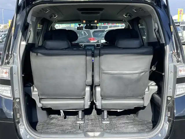 トヨタ ヴェルファイア 2．4Z Gエディション 道央・札幌 2012(平24)年 8.4万km ブラック ４WD/純正ディーラーOPナビ/CD/DVD/BT/フルセグ/純正フリップダウンモニター/横滑り防止装置/クルーズコントロール/クリアランスソナー/パーキングアシスト/センターデフロック/バックカメラ/ビルトインETC/ドライブレコーダー/ECOMODE/nanoe/両側パワースライドドア/パワーバックドア/前席/２列目パワーシート/D席メモリーシート/N席/２列目オットマン/革巻きウッドコンビステアリング/ステアリングリモコン/MTモード付AT/プッシュスタート/スマートキー/HIDヘッドライト/オートライト/フォグランプ/電動格納ミラー/ウィンカーミラー/純正フロアマット/ドアバイザー/スペアキー/社外エンジンスターター