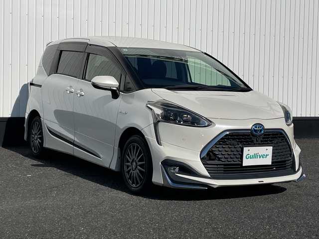 トヨタ シエンタ ハイブリッド G クエロ 千葉県 2019(令1)年 5.6万km ホワイトパールクリスタルシャイン 純正9インチナビ/(AM/FM/BT/TV/DVD)/モデリスタエアロ/全周囲カメラ/トヨタセーフティセンス/ドライブレコーダー/衝突被害軽減システム/車線逸脱警報/クルーズコントロール/ハーフレザーシート/両側パワースライドドア/横滑り防止装置/ETC/LEDヘッドライト/フォグランプ/オートライト/ウィンカーミラー/電動格納ミラー/社外15インチAW/シートヒーター/シートリフター/ステアリングヒーター/プッシュスタート/スマートキー/フロアマット