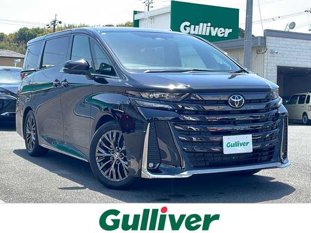 トヨタ ヴェルファイア ハイブリット Z プレミア 山口県 2024(令6)年 0.6万km ブラック 禁煙車/ワンオーナー/メーカーオプションナビ/(AM/FM/Bluetooth/USB/フルセグTV)/全周囲カメラ/前後ドライブレコーダー/ビルトインETC2.0/トヨタセーフティセンス/パノラマルーフ/デジタルインナーミラー/ユニバーサルステップ/レーダークルーズコントロール/クリアランスソナー/パワーバックドア/両側パワースライドドア/茶革レザーシート/パワーシート/シートヒーター/エアシート/パドルシフト/オートライト/オートハイビーム/LEDヘッドランプ/フォグランプ/プッシュスタート/スマートキー/置くだけ充電/後席サンシェード/ステアリングスイッチ/純正アルミホイール/社外フロアマット/取扱説明書/保証書/記録簿
