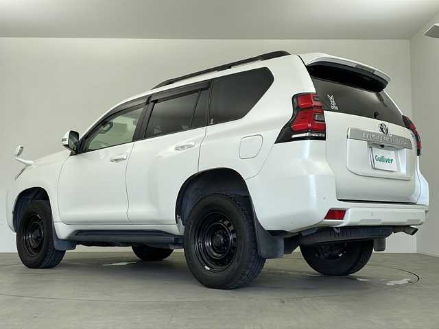 トヨタ ランドクルーザー プラド TX Lパッケージ 鹿児島県 2019(令1)年 16万km ホワイトパールクリスタルシャイン 純正ＳＤナビ　/（フルセグ/Bluetooth/CD/DVD）/レーダークルーズコントロール　/バックカメラ　/ドライブレコーダー　/ビルドインＥＴＣ　/前席シートヒーター　/前席エアシート　/シートベンチレーション　/ジオランダーＡＴタイヤ　/ドアバイザー　/ルーフレール/純正フロアマット/オートライト/オートマチックハイビーム/前席パワーシート/レザーシート/スマートキー/取扱説明書