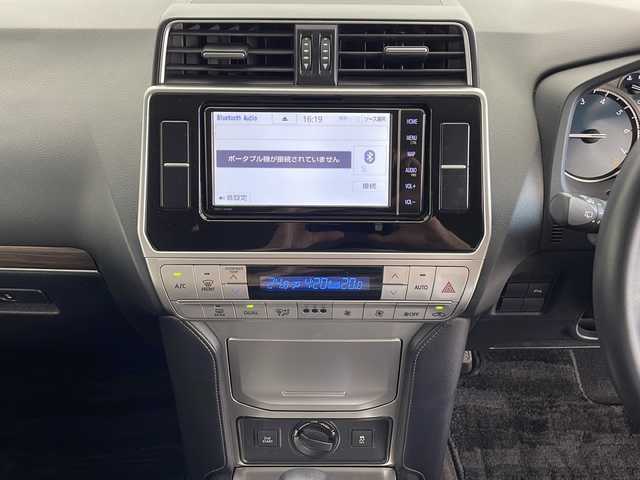 トヨタ ランドクルーザー プラド TX Lパッケージ 鹿児島県 2019(令1)年 16万km ホワイトパールクリスタルシャイン 純正ＳＤナビ　/（フルセグ/Bluetooth/CD/DVD）/レーダークルーズコントロール　/バックカメラ　/ドライブレコーダー　/ビルドインＥＴＣ　/前席シートヒーター　/前席エアシート　/シートベンチレーション　/ジオランダーＡＴタイヤ　/ドアバイザー　/ルーフレール/純正フロアマット/オートライト/オートマチックハイビーム/前席パワーシート/レザーシート/スマートキー/取扱説明書