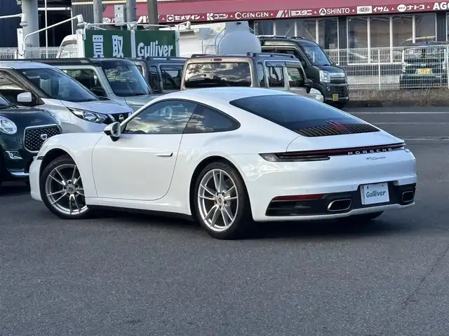ポルシェ ９１１ カレラ 愛知県 2020(令2)年 1.7万km ピュアホワイト /禁煙/正規ディーラー車/ディーラー記録簿R2.3.4.5.7//スポーツクロノパッケージ/エグゾースト/PASM//純正ナビ/BT/USB/AndroidAuto/AppleCarPlay//全方位カメラ/ETC/ドラレコ//革巻きステア/ステアスイッチ/パドルシフト//黒革シート/シートヒーター//電動パーキングブレーキ//電動リアスポイラー//照明付きバニティミラー//走行モード//ポルシェアクティブセーフ//マトリクスLEDヘッドライト//新車時保証書//取扱説明書//スペアスマートキー