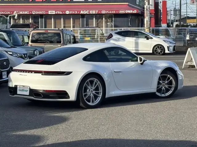 ポルシェ ９１１ カレラ 愛知県 2020(令2)年 1.7万km ピュアホワイト /禁煙/正規ディーラー車/ディーラー記録簿R2.3.4.5.7//スポーツクロノパッケージ/エグゾースト/PASM//純正ナビ/BT/USB/AndroidAuto/AppleCarPlay//全方位カメラ/ETC/ドラレコ//革巻きステア/ステアスイッチ/パドルシフト//黒革シート/シートヒーター//電動パーキングブレーキ//電動リアスポイラー//照明付きバニティミラー//走行モード//ポルシェアクティブセーフ//マトリクスLEDヘッドライト//新車時保証書//取扱説明書//スペアスマートキー