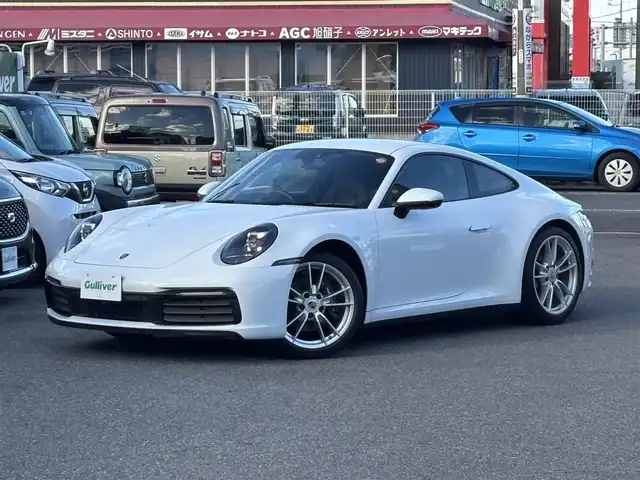 ポルシェ ９１１ カレラ 愛知県 2020(令2)年 1.7万km ピュアホワイト /禁煙/正規ディーラー車/ディーラー記録簿R2.3.4.5.7//スポーツクロノパッケージ/エグゾースト/PASM//純正ナビ/BT/USB/AndroidAuto/AppleCarPlay//全方位カメラ/ETC/ドラレコ//革巻きステア/ステアスイッチ/パドルシフト//黒革シート/シートヒーター//電動パーキングブレーキ//電動リアスポイラー//照明付きバニティミラー//走行モード//ポルシェアクティブセーフ//マトリクスLEDヘッドライト//新車時保証書//取扱説明書//スペアスマートキー