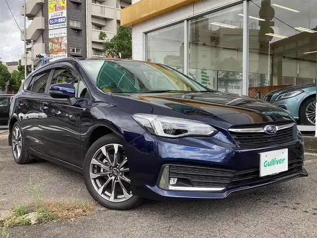 スバル インプレッサ スポーツ 2．0i－L アイサイト 鹿児島県 2019(令1)年 0.5万km ダークブルーパール アイサイト/　誤発進、誤後進抑制制御/　プリクラッシュブレーキ/ケンウッドOPナビ：KXM-H704/　フルセグTV.DVD.CD.SD.BT/バック、サイドカメラ/HKSマフラー/ドラレコ前後/ETC/追従機能付クルーズコントロール/LEDヘッドライト/前席パワーシート/コーナーセンサー/アクセスキー/新車保証書/取扱説明書/ナビ取扱説明書