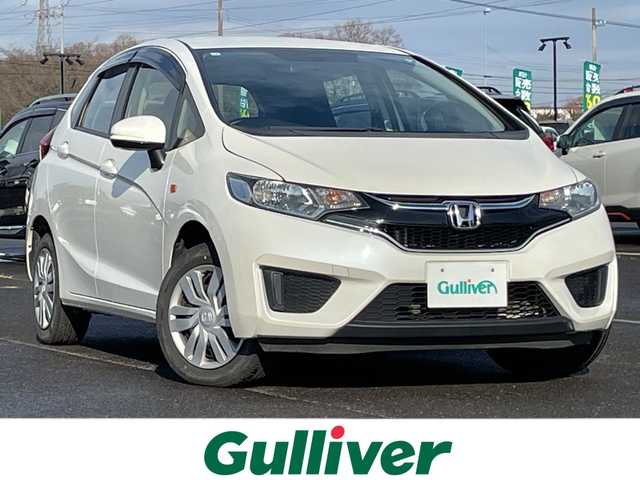 ホンダ フィット 13G 道央・札幌 2016(平28)年 8.4万km プレミアムホワイトパールⅡ ４WD/社外オーディオ/AM/FM/CD/AUX/横滑り防止装置/アイドリングストップ/ECON/リモコンキー/ハロゲンヘッドライト/ヘッドライトレベライザー/ウィンカーミラー/社外フロアマット/ドアバイザー/スチールホイール付冬タイヤ積込/185/60/R15/2023年/山5mm