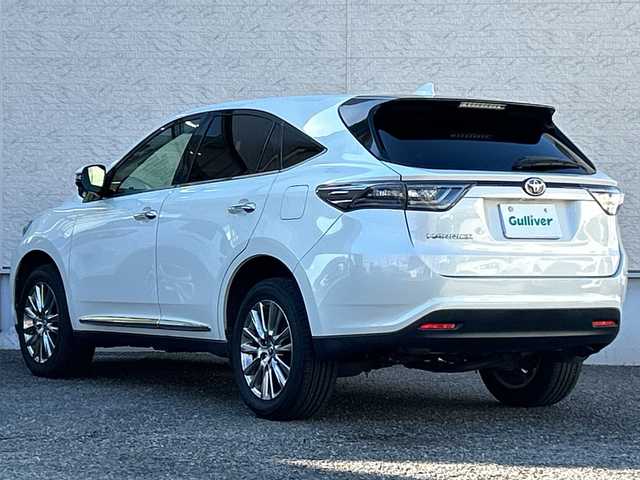 トヨタ ハリアー プレミアム 大阪府 2016(平28)年 9.4万km ホワイトパールクリスタルシャイン ワンオーナー/社外9インチメモリナビ（ALPINE）/BT/CD/DVD/フルセグTV/iPod/AUX/フリップダウンモニター（ALPINE）/GPSレーダー探知機（VA-710E）/バックカメラ/レーンキープアシスト/レーンデパーチャーアラート/クルーズコントロール/オートマチックハイビーム/パワーシート/電動リアゲート/電動チルト・テレスコピック・ステアリング/プッシュスタート/LEDフロントフォグ/純正アルミホイール/純正フロアマット/ドライブレコーダー/ETC