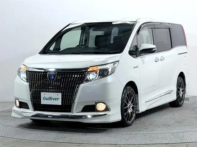 トヨタ エスクァイア ハイブリッド Gi 大阪府 2015(平27)年 6.2万km ホワイトパールクリスタルシャイン モデリスタエアロ　アルパインナビＴＶ　後席モニター　黒革シート　ワイヤレス充電　両側電動　シートヒーター　バックカメラ　ビルトインＥＴＣ　オートライト　ＬＥＤヘッドライト　フォグランプ　スマートキー