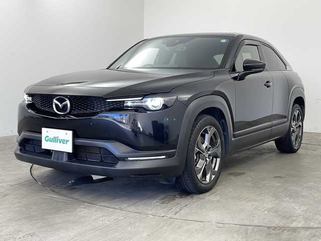 マツダ ＭＸ－３０ 兵庫県 2021(令3)年 3.5万km ジェットブラックマイカ ・ボーズサウンドシステム（ＡＵＤＩＯＰＩＬＯＴ２＋Ｃｅｎｔｅｒｐｏｉｎｔ２）＋１２スピーカー/・ベーシックＰＫＧ/・エクステリアＰＫＧ/・インテリアＰＫＧ（ブラウン内装）/・３６０°セーフティＰＫＧ/・ユーティリティＰＫＧ/・セーフティＰＫＧ/・運転席１０Ｗａｙパワーシート/・ドライビングポジションメモリー機能（シート位置／アクティブ・ドライビング・ディスプレイ／ドアミラー角度）/・アダプティブＬＥＤヘッドライト/・ヘッドランプユニット内シグネチャーＬＥＤランプ/・デイタイムランニングライト/・クルージング＆トラフィック・サポート/・i-ACTIVESENSE/・衝突軽減ブレーキ/・レーンキープアシストシステム/・ディスタンス＆スピードアラート/・スマートブレーキサポート/・ブラインドスポットモニター/・コーナーセンサー/・オートマチックハイビーム/・純正ナビ＆TV＆BT＆HDMI＆スマートフォン連携/・全方位カメラ/・ハーフレザーシート/・純正ビルトインETC/・純正18インチアルミホイール/・LEDライト/・前後ドライブレコーダー/・前席シートヒーター/・ステアリングヒーター/・スマートキー/・純正18インチAW