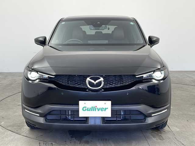 マツダ ＭＸ－３０ 兵庫県 2021(令3)年 3.5万km ジェットブラックマイカ ・ボーズサウンドシステム（ＡＵＤＩＯＰＩＬＯＴ２＋Ｃｅｎｔｅｒｐｏｉｎｔ２）＋１２スピーカー/・ベーシックＰＫＧ/・エクステリアＰＫＧ/・インテリアＰＫＧ（ブラウン内装）/・３６０°セーフティＰＫＧ/・ユーティリティＰＫＧ/・セーフティＰＫＧ/・運転席１０Ｗａｙパワーシート/・ドライビングポジションメモリー機能（シート位置／アクティブ・ドライビング・ディスプレイ／ドアミラー角度）/・アダプティブＬＥＤヘッドライト/・ヘッドランプユニット内シグネチャーＬＥＤランプ/・デイタイムランニングライト/・クルージング＆トラフィック・サポート/・i-ACTIVESENSE/・衝突軽減ブレーキ/・レーンキープアシストシステム/・ディスタンス＆スピードアラート/・スマートブレーキサポート/・ブラインドスポットモニター/・コーナーセンサー/・オートマチックハイビーム/・純正ナビ＆TV＆BT＆HDMI＆スマートフォン連携/・全方位カメラ/・ハーフレザーシート/・純正ビルトインETC/・純正18インチアルミホイール/・LEDライト/・前後ドライブレコーダー/・前席シートヒーター/・ステアリングヒーター/・スマートキー/・純正18インチAW