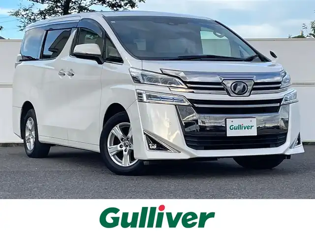 トヨタ ヴェルファイア X 岩手県 2018(平30)年 2万km ホワイトパールクリスタルシャイン セーフティセンス　フリップダウン　両側電動スライド　９型ナビ　前後個別再生　バックＣ　フルセグＴＶ　クルコン　ビルドインＥＴＣ２．０　ドラレコ　レーダークルーズ　オートハイビーム　オートＬＥＤライト