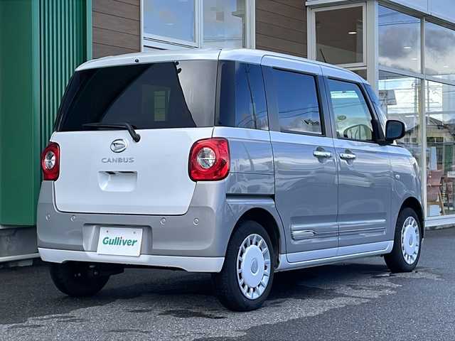 ダイハツ ムーヴ キャンバス ストライプス G 愛知県 2023(令5)年 1.8万km シャイニングホワイトパール/スムーズグレーマイカメタリック 禁煙車/AM/FM/CD/DVD/USB/純正ナビ/フルセグTV/アラウンドビュー/衝突軽減ブレーキ/前後コーナーセンサー/両側パワースライドドア/前席シートヒーター/ホットカップホルダー/アイドリングストップ/ETC/サイドエアバッグ/電子パーキング/盗難防止/純正フロアマット/プッシュスタート/電動格納ミラー/スマートキー