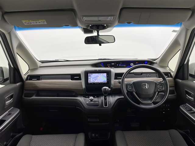 ホンダ フリード G ホンダセンシング 愛知県 2021(令3)年 5万km プラチナホワイトパール 純正ナビ【VXM-214VFi】/バックカメラ/フルセグTV・Bluetooth・CD・DVD・USB/ETC/両側パワースライドドア/ホンダセンシング/衝突軽減ブレーキ/誤発進抑制/後方誤発進抑制/歩行者事故低減ステアリング/先行車発進告知/標識認識/路外逸脱抑制/アダプティブクルーズコントロール/車線維持支援システム/アイドリングストップ/ヒルスタートアシスト/横滑り防止/ハロゲンヘッド/オートライト/純正フロアマット/プッシュスタート/スマートキー/スペアキー1本/保証書/取扱説明書・ナビ説明書