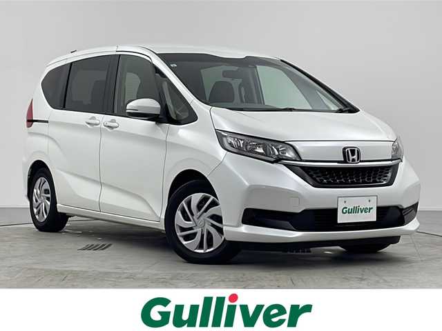 ホンダ フリード G ホンダセンシング 愛知県 2021(令3)年 5万km プラチナホワイトパール 純正ナビ【VXM-214VFi】/バックカメラ/フルセグTV・Bluetooth・CD・DVD・USB/ETC/両側パワースライドドア/ホンダセンシング/衝突軽減ブレーキ/誤発進抑制/後方誤発進抑制/歩行者事故低減ステアリング/先行車発進告知/標識認識/路外逸脱抑制/アダプティブクルーズコントロール/車線維持支援システム/アイドリングストップ/ヒルスタートアシスト/横滑り防止/ハロゲンヘッド/オートライト/純正フロアマット/プッシュスタート/スマートキー/スペアキー1本/保証書/取扱説明書・ナビ説明書