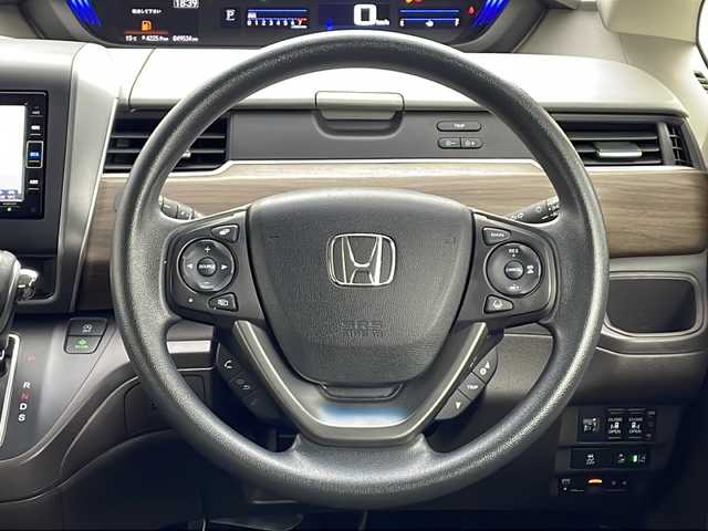 ホンダ フリード G ホンダセンシング 愛知県 2021(令3)年 5万km プラチナホワイトパール 純正ナビ【VXM-214VFi】/バックカメラ/フルセグTV・Bluetooth・CD・DVD・USB/ETC/両側パワースライドドア/ホンダセンシング/衝突軽減ブレーキ/誤発進抑制/後方誤発進抑制/歩行者事故低減ステアリング/先行車発進告知/標識認識/路外逸脱抑制/アダプティブクルーズコントロール/車線維持支援システム/アイドリングストップ/ヒルスタートアシスト/横滑り防止/ハロゲンヘッド/オートライト/純正フロアマット/プッシュスタート/スマートキー/スペアキー1本/保証書/取扱説明書・ナビ説明書