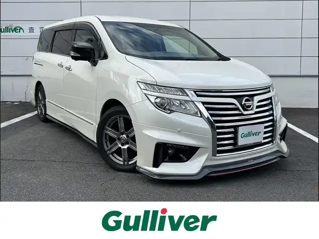 日産 エルグランド 250ハイウェイスターS 長崎県 2016(平28)年 9.7万km ブリリアントホワイトパール NISMOエアロ（F/S/R下）/純正ナビ/（CD/DVD/BT/フルセグ）/フリップダウンモニター/全方位カメラ/コーナーセンサー/クルーズコントロール/ETC/両側パワースライドドア/ハーフレザーシート/オートライト/NISMO18インチAW