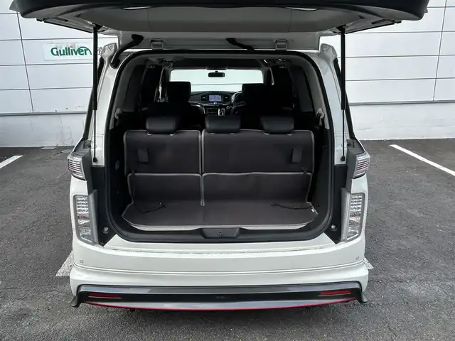 日産 エルグランド 250ハイウェイスターS 長崎県 2016(平28)年 9.7万km ブリリアントホワイトパール NISMOエアロ（F/S/R下）/純正ナビ/（CD/DVD/BT/フルセグ）/フリップダウンモニター/全方位カメラ/コーナーセンサー/クルーズコントロール/ETC/両側パワースライドドア/ハーフレザーシート/オートライト/NISMO18インチAW