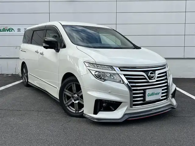 日産 エルグランド 250ハイウェイスターS 長崎県 2016(平28)年 9.7万km ブリリアントホワイトパール NISMOエアロ（F/S/R下）/純正ナビ/（CD/DVD/BT/フルセグ）/フリップダウンモニター/全方位カメラ/コーナーセンサー/クルーズコントロール/ETC/両側パワースライドドア/ハーフレザーシート/オートライト/NISMO18インチAW