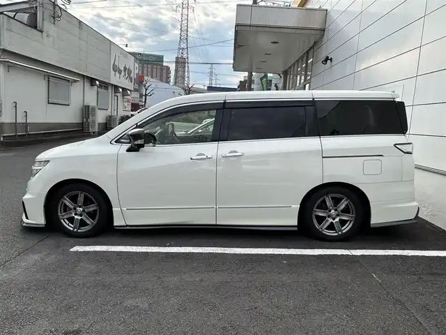 日産 エルグランド 250ハイウェイスターS 長崎県 2016(平28)年 9.7万km ブリリアントホワイトパール NISMOエアロ（F/S/R下）/純正ナビ/（CD/DVD/BT/フルセグ）/フリップダウンモニター/全方位カメラ/コーナーセンサー/クルーズコントロール/ETC/両側パワースライドドア/ハーフレザーシート/オートライト/NISMO18インチAW