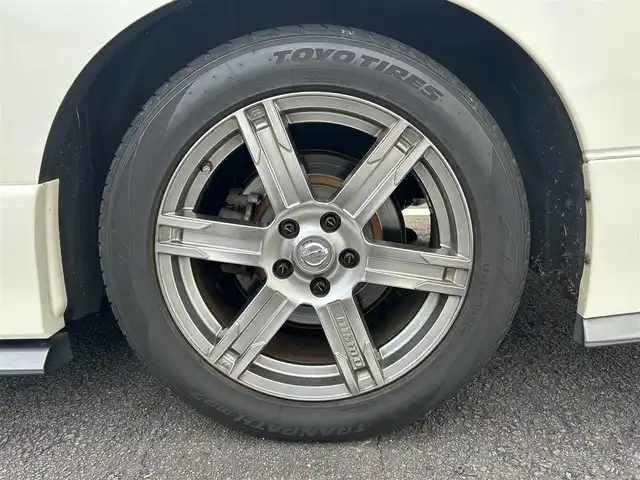 日産 エルグランド 250ハイウェイスターS 長崎県 2016(平28)年 9.7万km ブリリアントホワイトパール NISMOエアロ（F/S/R下）/純正ナビ/（CD/DVD/BT/フルセグ）/フリップダウンモニター/全方位カメラ/コーナーセンサー/クルーズコントロール/ETC/両側パワースライドドア/ハーフレザーシート/オートライト/NISMO18インチAW