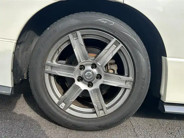 日産 エルグランド 250ハイウェイスターS 長崎県 2016(平28)年 9.7万km ブリリアントホワイトパール NISMOエアロ（F/S/R下）/純正ナビ/（CD/DVD/BT/フルセグ）/フリップダウンモニター/全方位カメラ/コーナーセンサー/クルーズコントロール/ETC/両側パワースライドドア/ハーフレザーシート/オートライト/NISMO18インチAW