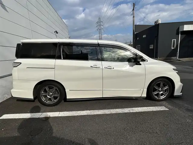 日産 エルグランド 250ハイウェイスターS 長崎県 2016(平28)年 9.7万km ブリリアントホワイトパール NISMOエアロ（F/S/R下）/純正ナビ/（CD/DVD/BT/フルセグ）/フリップダウンモニター/全方位カメラ/コーナーセンサー/クルーズコントロール/ETC/両側パワースライドドア/ハーフレザーシート/オートライト/NISMO18インチAW