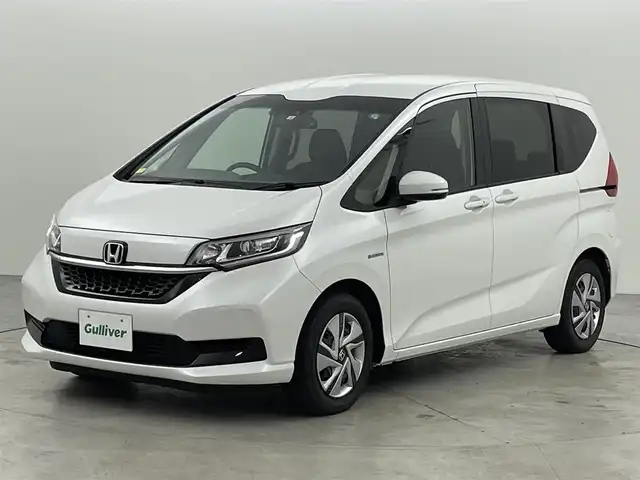 ホンダ フリード ハイブリット G ホンダセンシング 福岡県 2021(令3)年 3万km プラチナホワイトパール 純正ナビ（フルセグＴＶ）　/バックカメラ　/ビルトインＥＴＣ　/前方ドラレコ　/ＡＣＣ　/ホンダセンシング　/衝突被害軽減ブレーキ　/レーンキープ　/両側電動スライドドア　/シートヒーター　/ステアリングリモコン　/ＬＥＤ