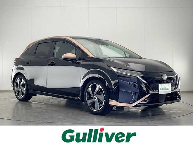 日産 オーラ G レザーエディション 宮崎県 2022(令4)年 4.4万km ミッドナイトブラック/サンライズカッパー 禁煙車/エマージェンシーブレーキ/純正9型ディスプレイオーディオナビTV/（高解像度モニター/Bluetooth/USB/HDMI/フルセグTV)/純正BOSEサウンドシステム/純正ドライブレコーダー/純正ビルトイン2.0ETC/純正LEDオートライト/純正LEDフォグ/純正17インチアルミ/純正フロアマット/黒本革シート/プロパイロット/アラウンドビューモニター/クリアランスソナー/ブラインドスポットモニター/スマートルームミラー/電子パーキング/オートホールド/オートエアコン/本革巻ハンドル/インテリジェントキー/プッシュエンジンスタート/スペアキー/新車時保証書/取扱い説明書