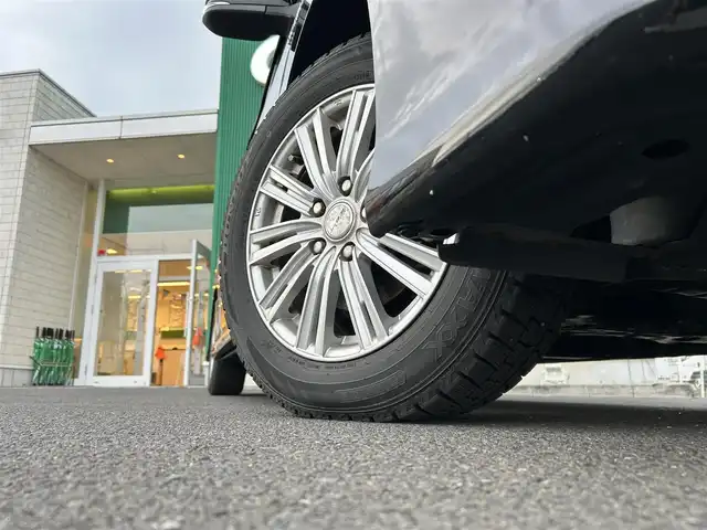 トヨタ ヴォクシー ハイブリッド ZS 宮城県 2016(平28)年 11.2万km ブラック 純正SDナビ　/(NSZT -W66T/フルセグTV)/フリップダウンモニター/(ALPINE10インチ)/バックカメラ/両側パワースライドドア/セーフティセンスC/・プリクラッシュセーフティシステム/・レーンディパーチャーアラート/・オートマチックハイビーム/LEDヘッドライト/スマートキー/ETC/純正アルミ16インチ(サマータイヤ)積み込み/取扱説明書/スペアキー