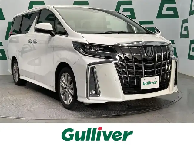 トヨタ アルファード S 鹿児島県 2022(令4)年 6.7万km ホワイトパールクリスタルシャイン 純正ナビ/トヨタセーフティセンス/衝突被害軽減ブレーキ　/バックカメラ/両側パワースライドドア/レーンキープアシスト　/前後コーナーセンサー/アイドリングストップ　/フロアマット/ＬＥＤヘッドライト　/オートライト/オートマチックハイビーム　/追従型クルーズコントロール/純正アルミホイール/横滑り防止機能/ＥＴＣ