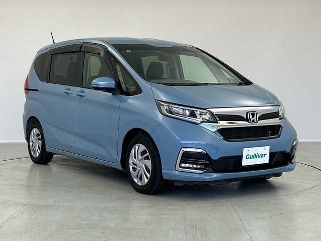 ホンダ フリード G ホンダセンシング 茨城県 2021(令3)年 3.2万km シーグラスブルーパール 純正ナビ　/バックカメラ　/両側電動スライドドア　/追従型クルーズコントロール　/シートヒーター　/純正ドライブレコーダー前後　/ホンダセンシング　/衝突被害軽減ブレーキ　/コーナーセンサー　/純正フロアマット　/禁煙車