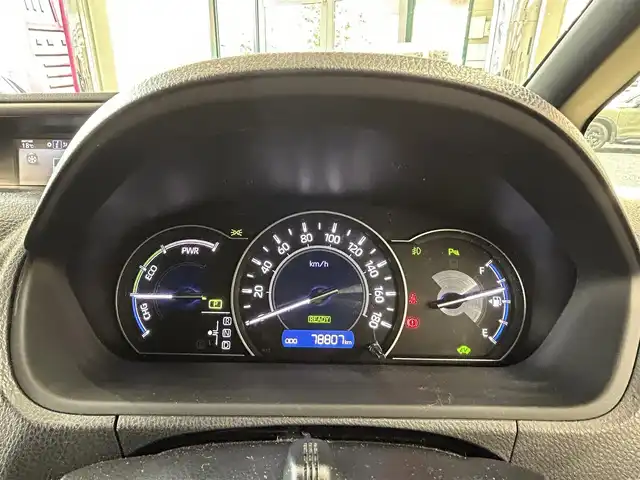 トヨタ ヴォクシー ハイブリッド ZS 煌Ⅱ 東京都 2019(令1)年 7.9万km ホワイトパールクリスタルシャイン ・純正10インチナビ/（NSZN-Z68T）/（CD/DVD/フルセグ/Bluetooth/HDMI）/・フリップダウン/・バックカメラ/・前後コーナーセンサー/・両側パワースライドドア/・前後ドライブレコーダー/・シートヒーター/・オートライト/・オートハイビーム/・LEDライト/・フロントフォグ/・衝突軽減システム/・LKA/・スマートキー/・プッシュスタート/・電動格納ミラー/・ETC2.0/・ステアリングスイッチ/・クルーズコントロール/・リアプライバシーガラス/・ISOFIX/・バイザー/・フロアマット/・純正16インチアルミホイール/・WSRS&ABS/・横滑り防止システム/・新車時保証書/・取扱説明書