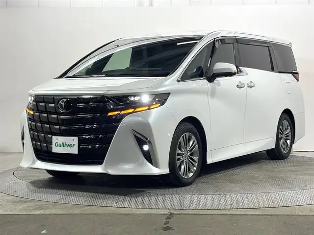 トヨタ アルファード Z 大阪府 2024(令6)年 0.7万km プラチナホワイトパールマイカ 純正ナビTV 360カメラ 後席モニター 黒革シート パワーシート/ヒーター/エアコン 電動リアゲート ハンドルヒーター 衝突軽減 レーダーC BSM クリアランスソナー 置き型充電 100V電源