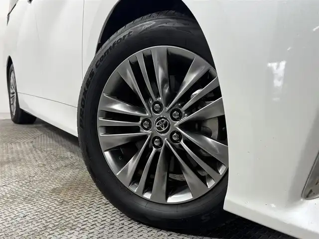 トヨタ アルファード Z 大阪府 2024(令6)年 0.7万km プラチナホワイトパールマイカ 純正ナビTV 360カメラ 後席モニター 黒革シート パワーシート/ヒーター/エアコン 電動リアゲート ハンドルヒーター 衝突軽減 レーダーC BSM クリアランスソナー 置き型充電 100V電源