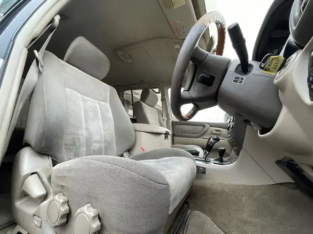 トヨタ ランドクルーザー VX－LTD 長野県 2001(平13)年 16.2万km ホワイトパールマイカ ４WD/社外ナビ/・CD/DVD/TV/社外ETC/純正フロアマット/オートライト/純正ドアバイザー/3列シート/電格ミラー/スペアキー有/取り扱い説明書/保証書