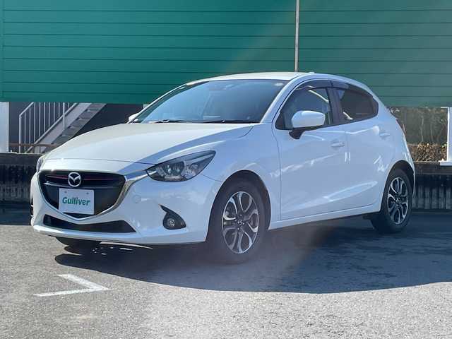 マツダ デミオ XD ツーリング 茨城県 2016(平28)年 2万km スノーフレイクホワイトパールマイカ 純正SDナビ/Bluetooth/フルセグTV/クルーズコントロール/アイドリングストップ/ETC/USB入力端子/ドライブレコーダー前後/シートヒーター/横滑り防止装置/衝突軽減システム/オートライト/LEDヘッドライト/純正16インチアルミホイール/純正フロアマット/スマートキー/プッシュスタート