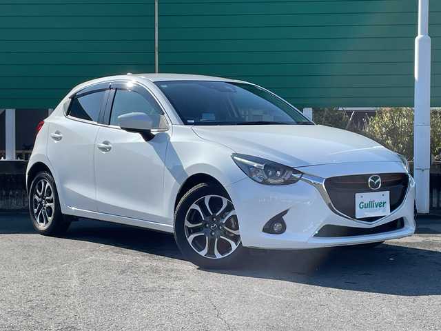 マツダ デミオ XD ツーリング 茨城県 2016(平28)年 2万km スノーフレイクホワイトパールマイカ 純正SDナビ/Bluetooth/フルセグTV/クルーズコントロール/アイドリングストップ/ETC/USB入力端子/ドライブレコーダー前後/シートヒーター/横滑り防止装置/衝突軽減システム/オートライト/LEDヘッドライト/純正16インチアルミホイール/純正フロアマット/スマートキー/プッシュスタート