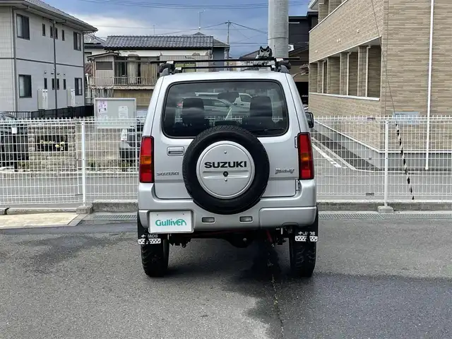 スズキ ジムニー XC 福島県 2015(平27)年 11.1万km シルキーシルバーメタリック ワンオーナー/パートタイム4WD/社外オーディオ(CD/USB)/社外足回り/マッドガード/ルーフキャリア/フォグライト/ドアバイザー/フロアマット/キーレス/ETC