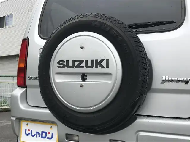 スズキ ジムニー XC 栃木県 2015(平27)年 11.1万km シルキーシルバーメタリック 株)IDOMが運営する【じしゃロン小山店】の自社ローン専用車両になります。こちらは現金またはオートローンご利用時の価格です。自社ローンご希望の方は別途その旨お申付け下さい//ワンオーナー/禁煙車/カーオーディオ/（CD/DVD/USD）/リモコンキー/ルーフレール/パワーウインドウ/防眩ミラー