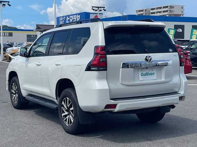 トヨタ ランドクルーザー プラド TX 長崎県 2018(平30)年 7.4万km ホワイトパールクリスタルシャイン 純正メモリーナビ/CD/DVD/BT/フルセグTV/バックカメラ/ウッドコンビハンドル（OP）/モデリスタフロントエアロ/トヨタセーフティセンス/レーダークルーズコントロール/レーンキープアシスト/ステアリングスイッチ/LEDヘッドライト/オートマチックハイビーム/ルーフレール/ドライブレコーダー/社外17インチAW/ビルトインETC