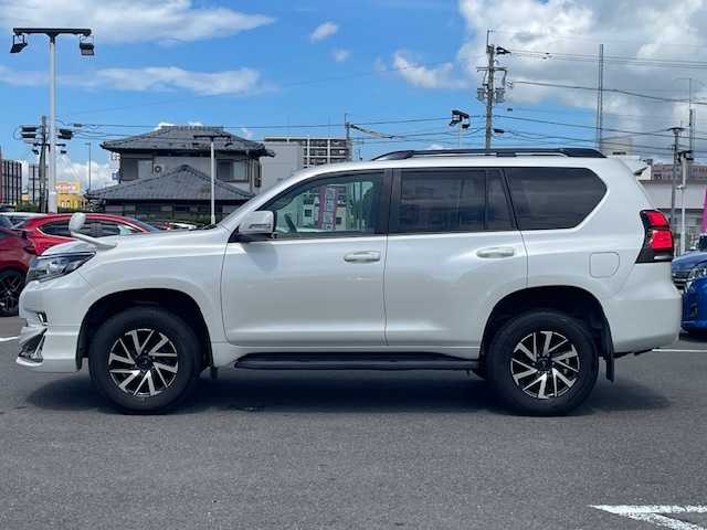 トヨタ ランドクルーザー プラド TX 長崎県 2018(平30)年 7.4万km ホワイトパールクリスタルシャイン 純正メモリーナビ/CD/DVD/BT/フルセグTV/バックカメラ/ウッドコンビハンドル（OP）/モデリスタフロントエアロ/トヨタセーフティセンス/レーダークルーズコントロール/レーンキープアシスト/ステアリングスイッチ/LEDヘッドライト/オートマチックハイビーム/ルーフレール/ドライブレコーダー/社外17インチAW/ビルトインETC