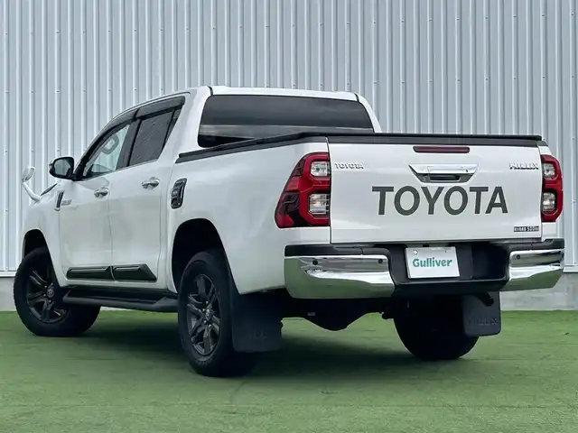 トヨタ ハイラックス Z 香川県 2021(令3)年 2.6万km スーパーホワイトⅡ 登録時走行距離：25681km/トヨタセーフティーセンス/→プリクラッシュセーフティ/→先行車発進アラート/→レーントレーシングアシスト/→レーダークルーズコントロール/→レーンキープアシスト/ALPINE11型ディスプレイオーディオ/→HDMI接続可能/→AppleCarPlay/AndroidAuto対応/バックカメラ/革巻きステアリング/ステアリングリモコン/ダウンヒルアシストコントロール/LEDヘッドライト/オートハイビーム/オートライト/ドライブレコーダー/純正17インチアルミホイール/スペアキー/スマートキー/プッシュスタート
